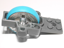 Part 11125c01 - Flywheel Plate 2 x 8 with Metal Flywheel and Dark Azure Tire (Chima Speedorz Rip Cord Base) - De BrickPlaats