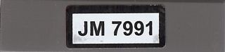 Part 2431pb0154 - Tile 1 x 4 with Black 'JM 7991' on White Background Pattern (Sticker) - Set 7991 - De BrickPlaats