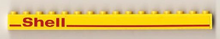 Part 2465pb07 - Brick 1 x 16 with Red Line and 'Shell' Left Pattern (Sticker) - Set 1256 - De BrickPlaats