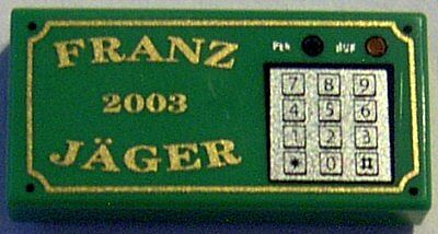 Part 3069pb0031 - Tile 1 x 2 with Gold 'FRANZ JÄGER', '2003', and Silver Numeric Keypad Pattern - De BrickPlaats