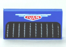 Part 3069pb0179 - Tile 1 x 2 with White 'IVAN' on Red Emblem, Black Grille Pattern - De BrickPlaats