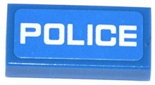 Part 3069pb0296 - Tile 1 x 2 with White 'POLICE' Thin Font on Blue Background Pattern (Sticker) - Sets 60041 / 60047 - De BrickPlaats