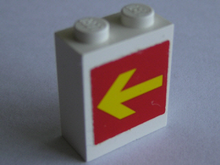 Part 3245bpb02 - Brick 1 x 2 x 2 with Inside Axle Holder with Yellow Arrow on Red Background Pattern on Both Sides (Stickers) - Set 1256 - De BrickPlaats