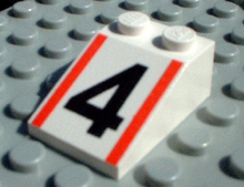 Part 3298pb025 - Slope 33 3 x 2 with Number 4 and Red Stripes Pattern - De BrickPlaats
