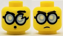 Part 3626pb2020 - Minifigure, Head Dual Sided Glasses Round with Bright Light Blue Lenses and Black Frames, Frown / Surprised Pattern (Steve) - De BrickPlaats