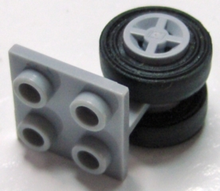 Part 4870c03 - Plate, Modified 2 x 2 Thin with Dual Wheels Holder - Split Pins with Light Bluish Gray Wheels and Black Tires (4870 / 4624 / 3139) - De BrickPlaats